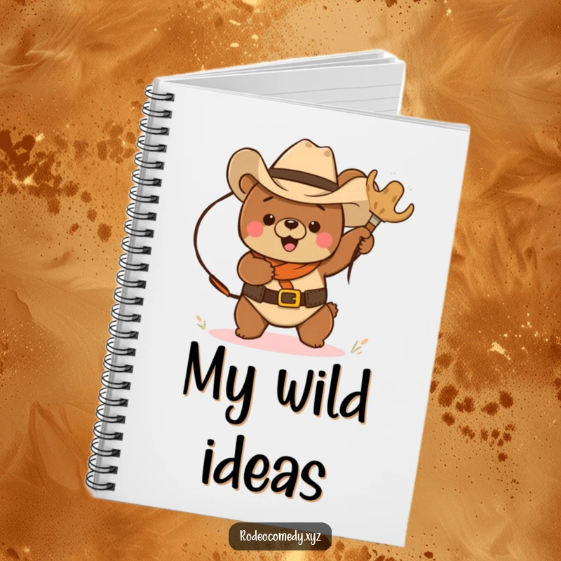Funny cowboy bear with a lasso, chasing a tumbleweed, on the cover of a lined notebook, ideal for jotting down funny thoughts.