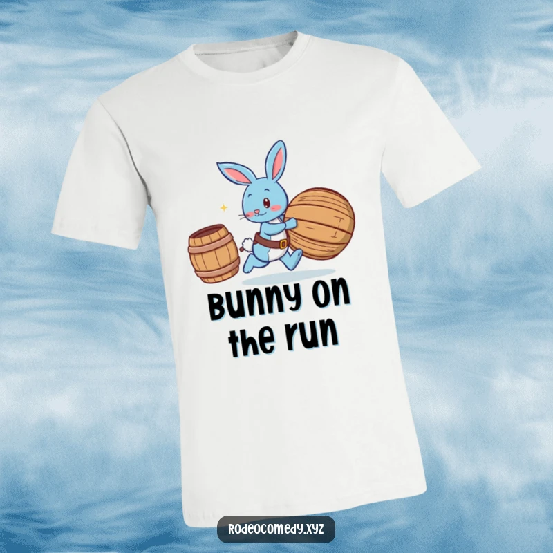 Funny blue bunny wearing spurs, playfully chasing a rolling barrel, on a humorous t-shirt, depicting a playful chase scene.