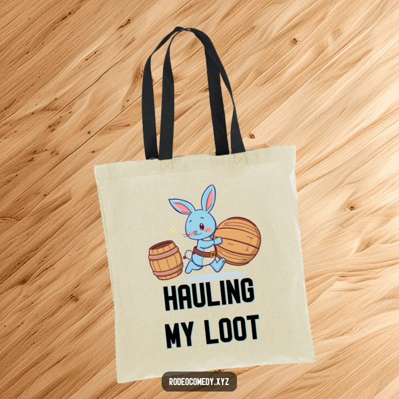 Funny blue bunny wearing spurs, chasing a rolling barrel, on a durable tote bag for carrying smiles and essentials.